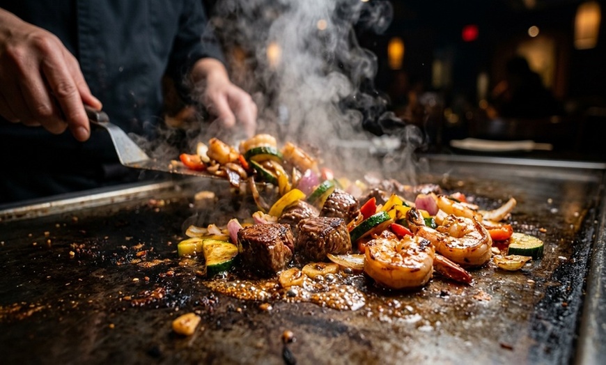 Image 3: Delight in Diverse Sushi Creations & Captivating Hibachi Showmanship!