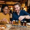 Image 2: Indulge in a German Bier Sampler with Pretzels for Two People at Helga's German Restaurant and Deli, up to 32% off