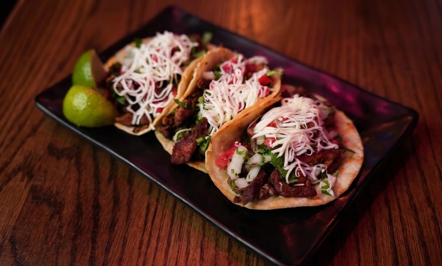 Image 14: Authentic Mexican Dining: Char-Grilled Flavors & Lively Atmosphere
