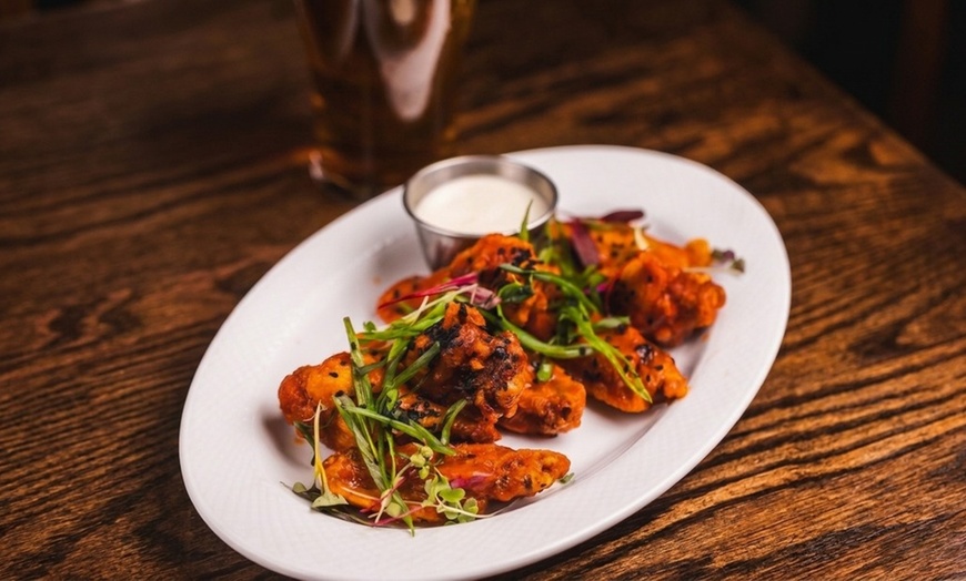 Image 14: Enjoy Dining Credit with Warm Ambiance at Lady Wilde's NYC