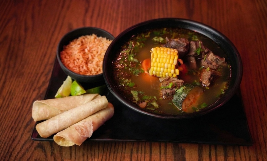 Image 9: Authentic Mexican Dining: Char-Grilled Flavors & Lively Atmosphere