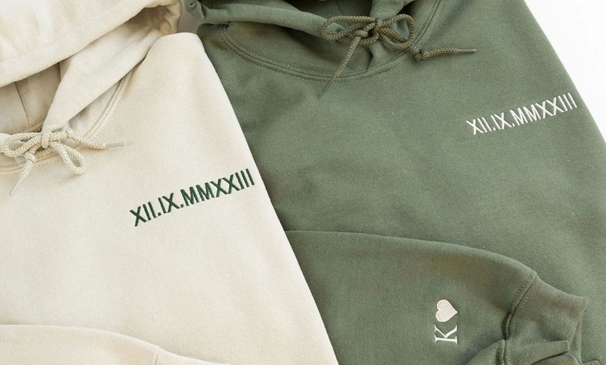 Image 14: Personalize a unisex hoodie for the perfect gift or stylish comfort!
