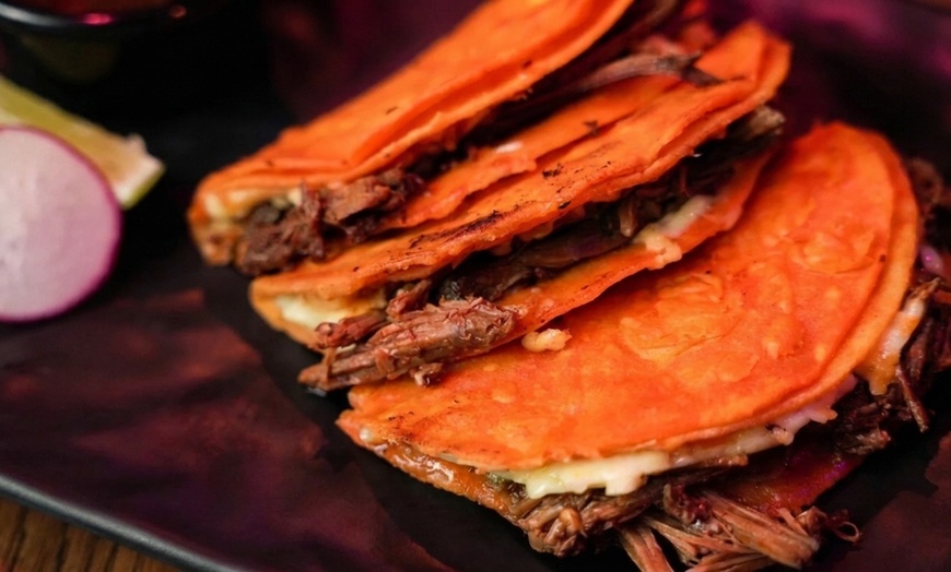 Image 6: Authentic Mexican Dining: Char-Grilled Flavors & Lively Atmosphere