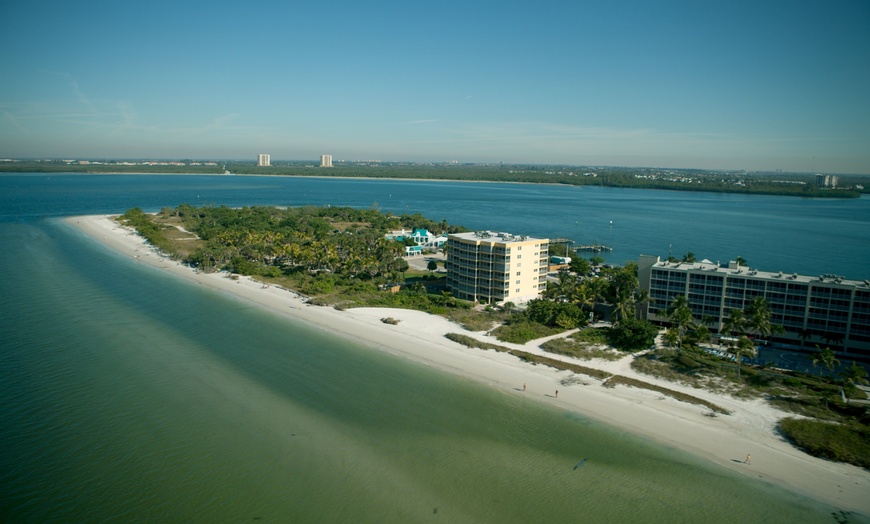 Image 25: Spacious suites, free breakfast, pool, and easy access to beaches
