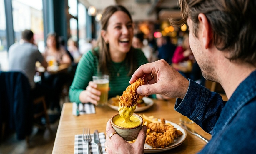 Image 2: Chicken Guy!: $50 or $100 Toward Tenders, Sandwiches & Bold Food