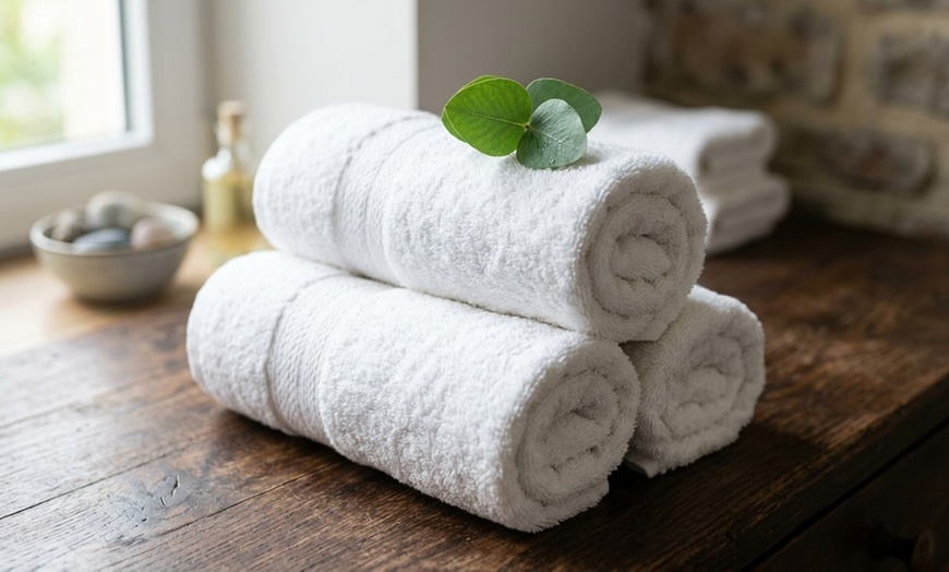 Image 4: 60-Minute Couples Massage with Hot Stones & Towels, Foot Scrub & Mask