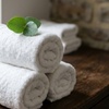 Image 4: 60-Minute Couples Massage with Hot Stones & Towels, Foot Scrub & Mask