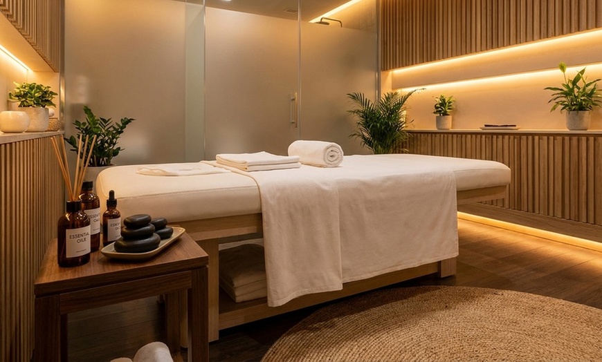 Image 4: Relaxing Couples Massage with Hot Towel and Stone Treatment
