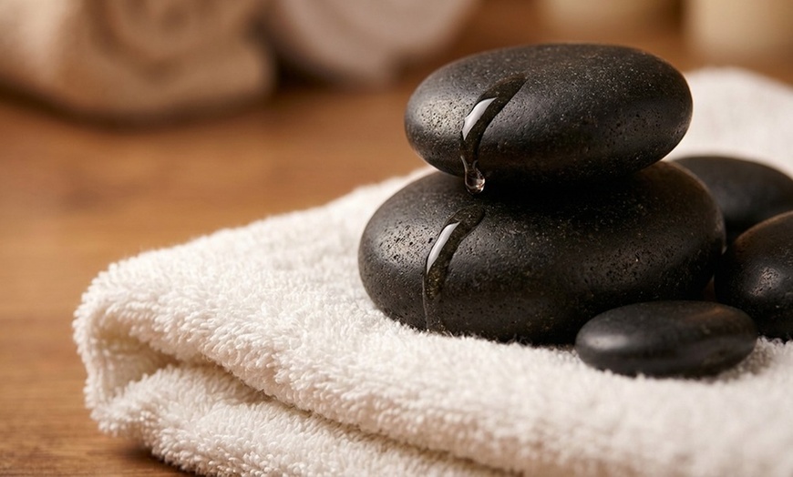 Image 5: Solo or Couples Massage w/ Hot Stones at Four Seasons Spa - Boston, MA