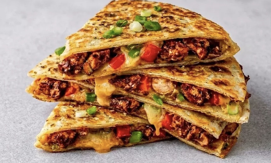 Image 2: Grab Tasty Bites w/ Delicious Mexican & Caribbean Cuisine in NYC