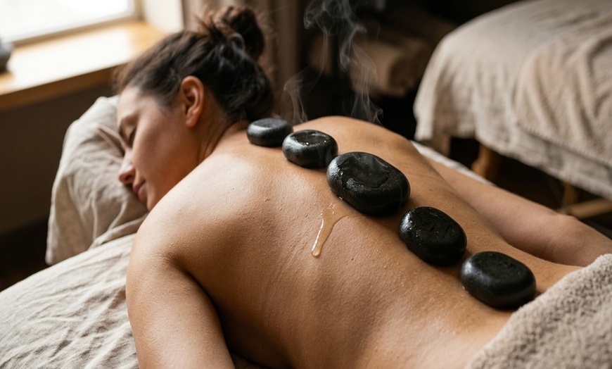 Image 8: Blissful Escape Awaits: 60 or 90-Minute Massage with Hot Stones, Cupping Therapy, and Back Scrub. Save Up to 45%