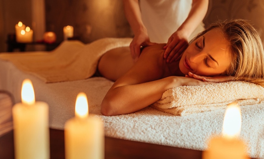 Image 2: Enjoy a 60-Minute Massage or Facial with Hot Stones & Scalp Treatment