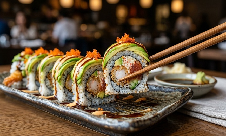 Image 2: Delight in Diverse Sushi Creations & Captivating Hibachi Showmanship!