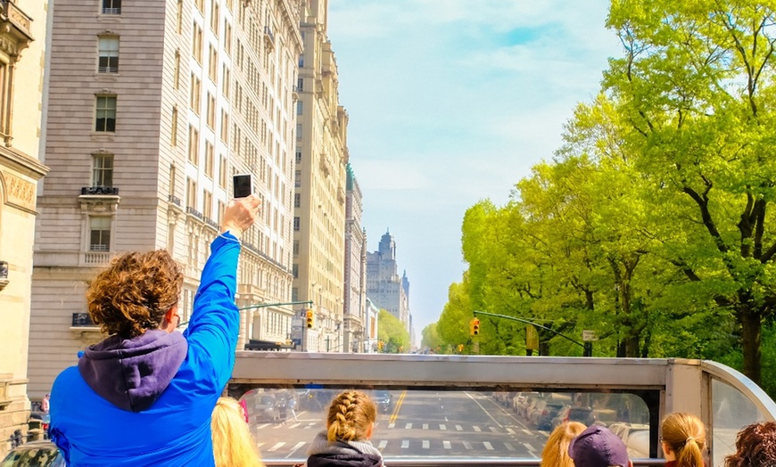 Image 2: Discover the Magic of New York City with Nighttime Open Bus Tour