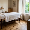 Image 1: Melt Away Body Aches with 60- or 90-Minute Full Body Massage at Synergy Bodywork and Massage (Up to 25% Off)