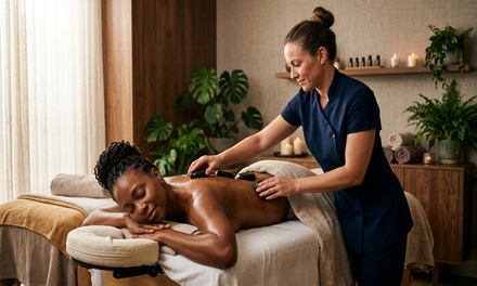 50-Minute Relaxation Massage with Hot Stones, Aromatherapy, and Foot Scrub - Essentials Massage And Facials Riverview