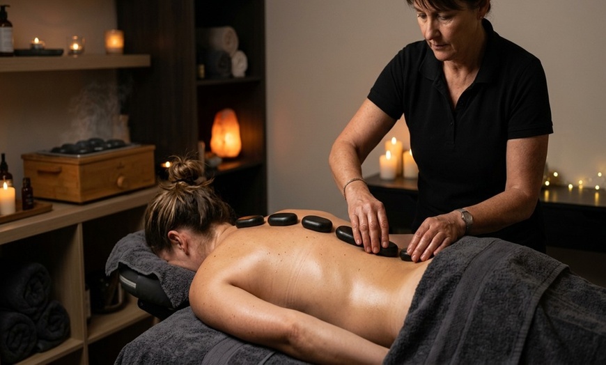 Image 5: Coconut Oil & Hot Stone Massage for Ultimate Relaxation