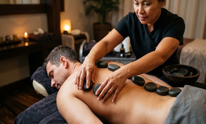 Image 4: Relax and Rejuvenate: 1-Hour Massage with Hot Stones & Foot Scrub