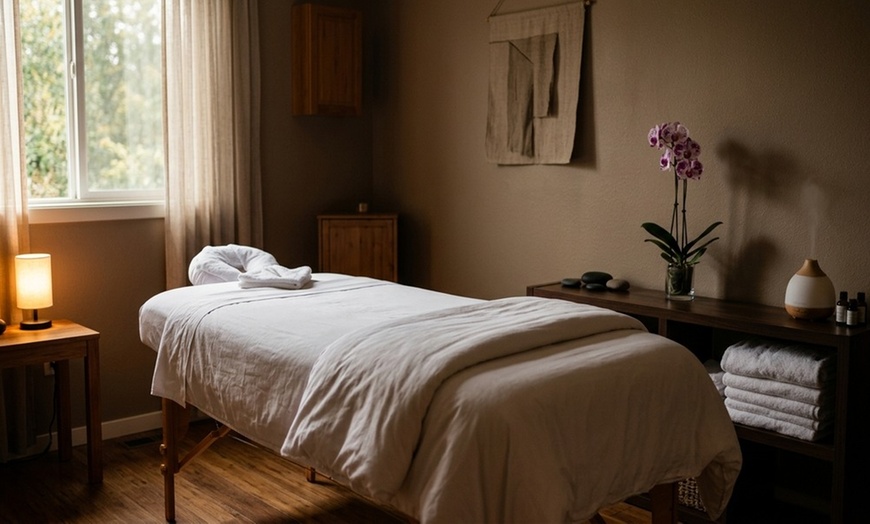 Image 3: 80-Minute FullBody & Foot Massage w/Hot Stones & Oils for One or Two