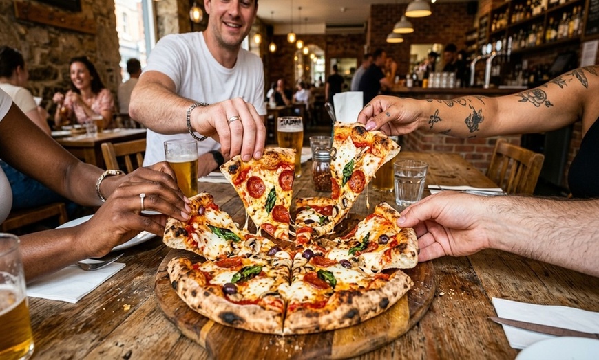 Image 2: Gourmet Pizza Shoppe offers two large 14'' pizzas with unique gourmet toppings, salads, and appetizers up to 37% off