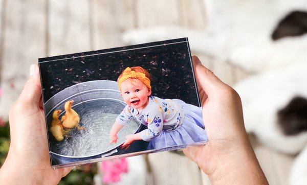 Close-up of a custom acrylic photo block with a family image