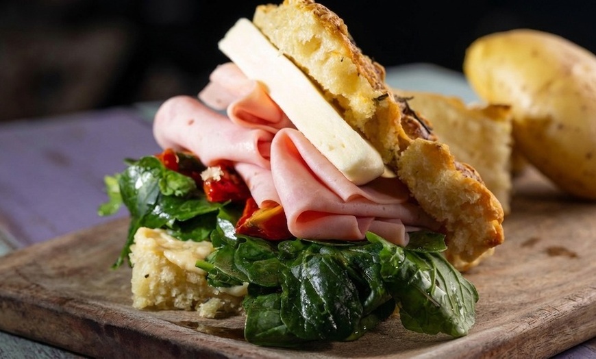 Image 2: Enjoy up to $50 worth of Italian Fare at Vics Pizza and Pasta Cafe