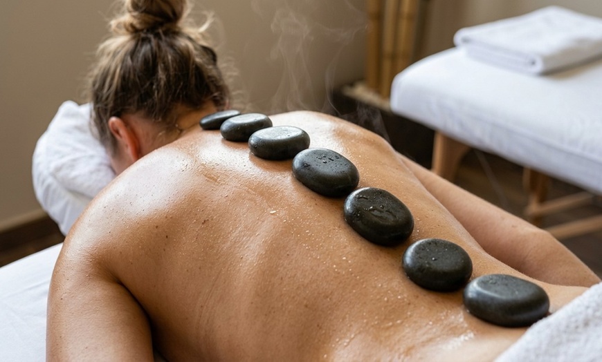 Image 7: 60-Min. Massage with Hot Stone for Individual or Couples