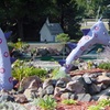 Image 3: Immerse in a Mini Golf Paradise with Whimsical Windmills and Dragons
