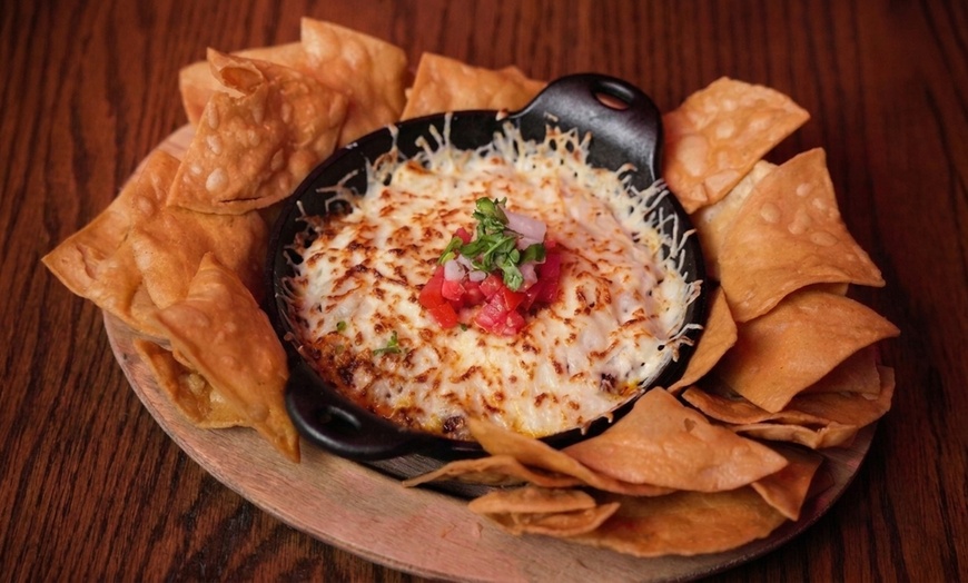 Image 3: Authentic Mexican Dining: Char-Grilled Flavors & Lively Atmosphere