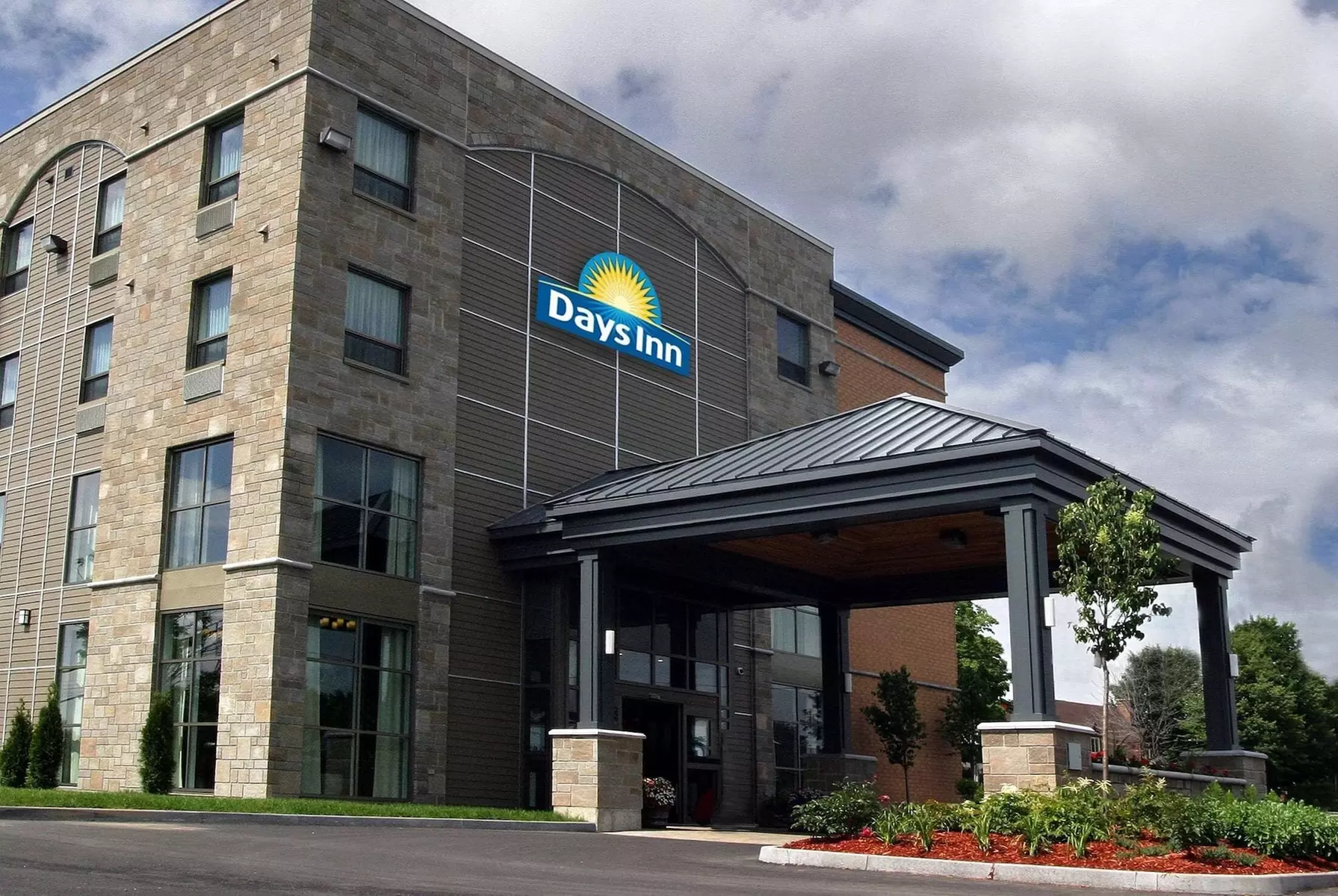 Days Inn by Wyndham Levis - Primary Image