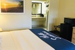 Days Inn & Suites by Wyndham Navarre - near Beaches/Hurlburt - Second Medium