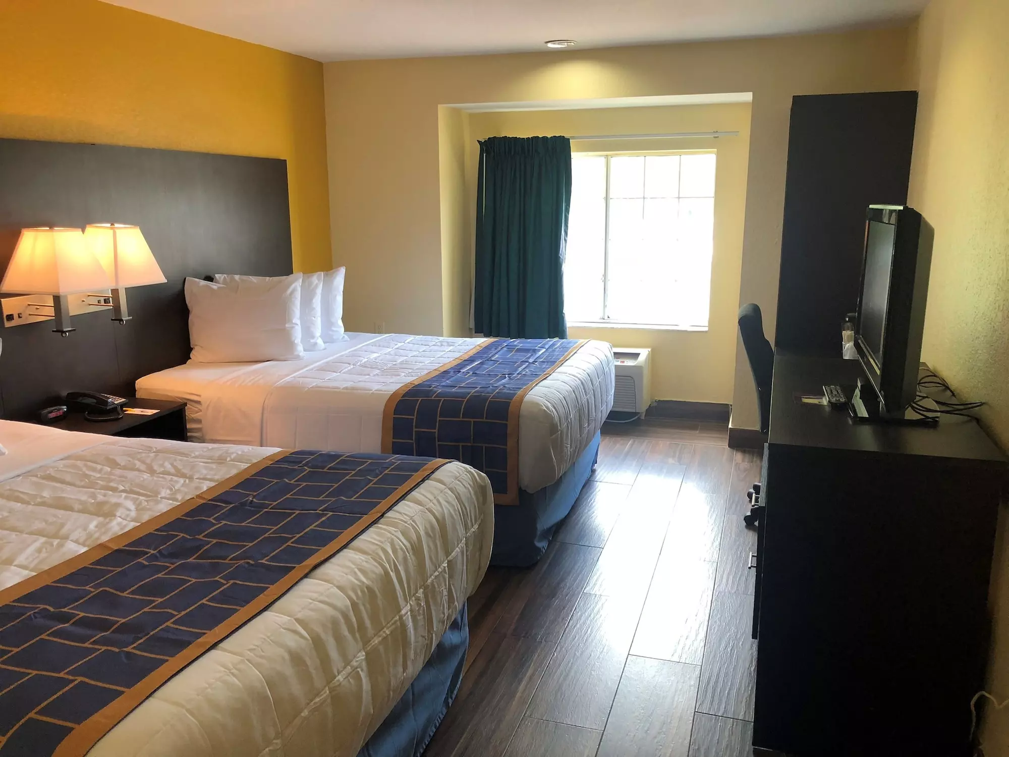 Days Inn & Suites by Wyndham Tampa/Raymond James Stadium - Primary Image