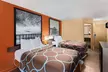 Super 8 by Wyndham Myrtle Beach/Market Common Area - Second Medium