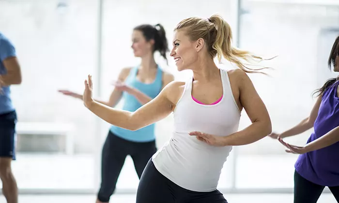 Discover energetic Zumba classes at Gina's Studio for Dance and Fitness, with flexible options for all skill levels, up to 42% off - Primary Image