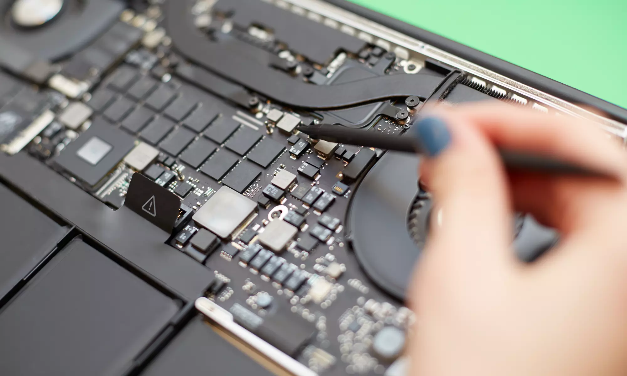 Mac or PC Repair Services or HDD to SSD Upgrade at One Stop IT Guru (Up to 45% Off). Two Options Available. - Primary Image