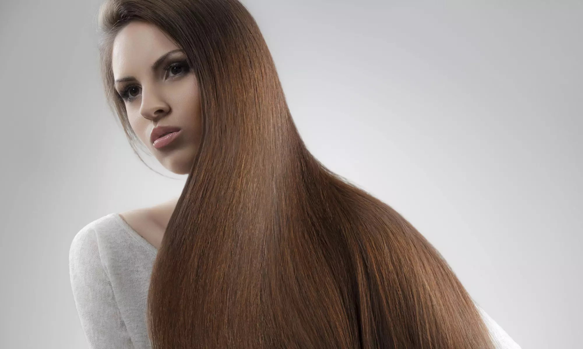 Brazilian Blowout with Optional haircut and Style at Hair By Sebo Salon (Up to 13% Off) - Primary Image