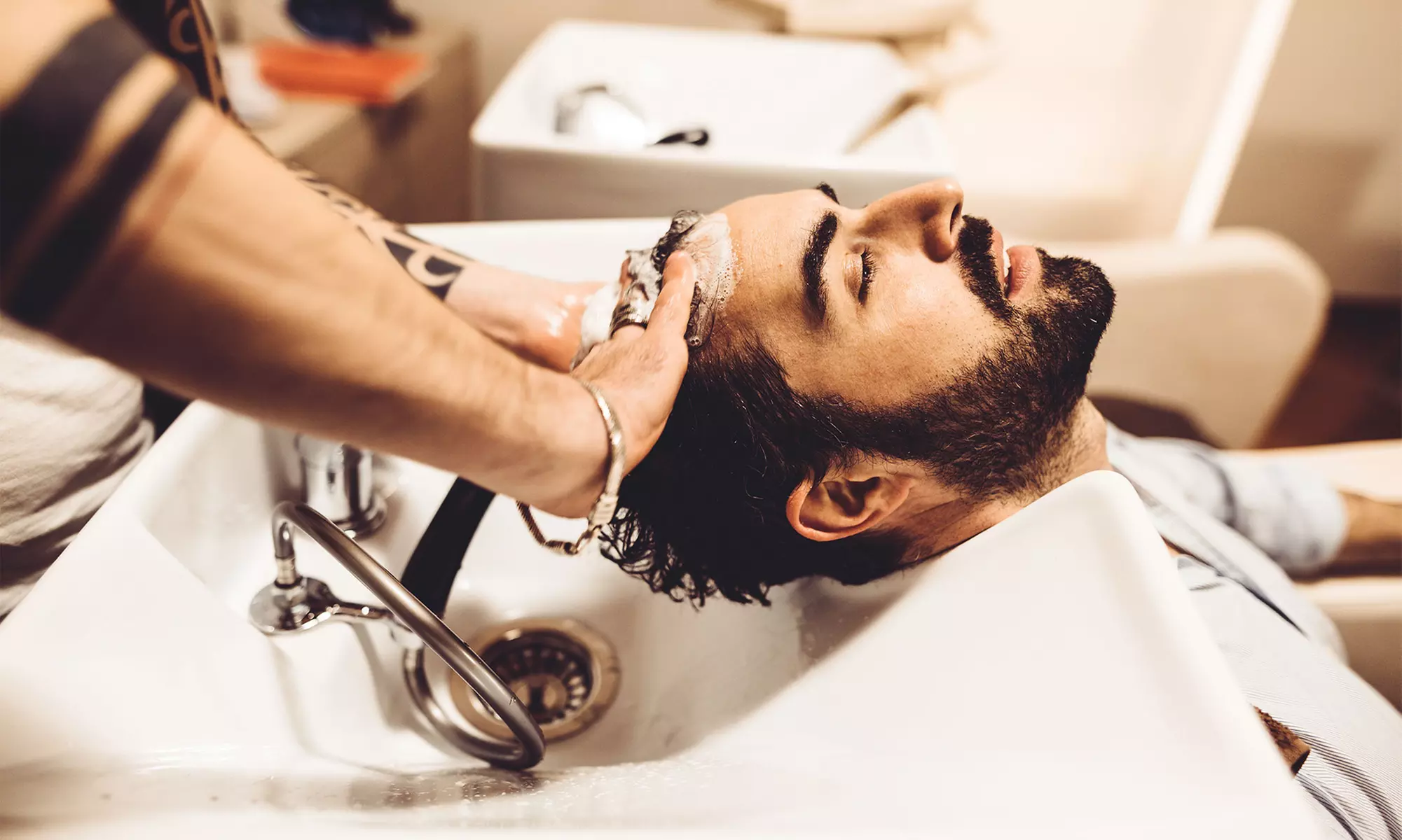 One or Two Men's Haircuts with Hot Towels, and Razor Linings at Vibes Barber Lounge (Up to 50% Off) - Primary Image