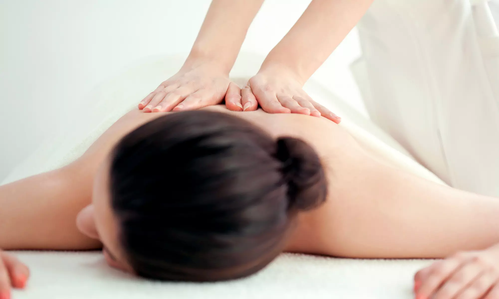 One, Two, or Three 60-Minute Swedish or Deep-Tissue Massages at Hoops Chiropractic and Massage (50% Off) - Primary Image