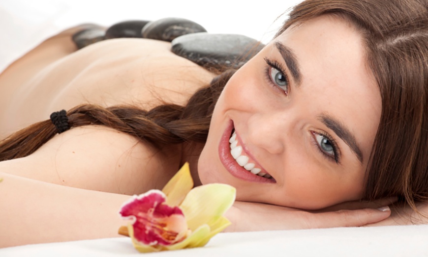Image 1: Experience 60-Min or 90-Min Swedish Massage with Hot Stones