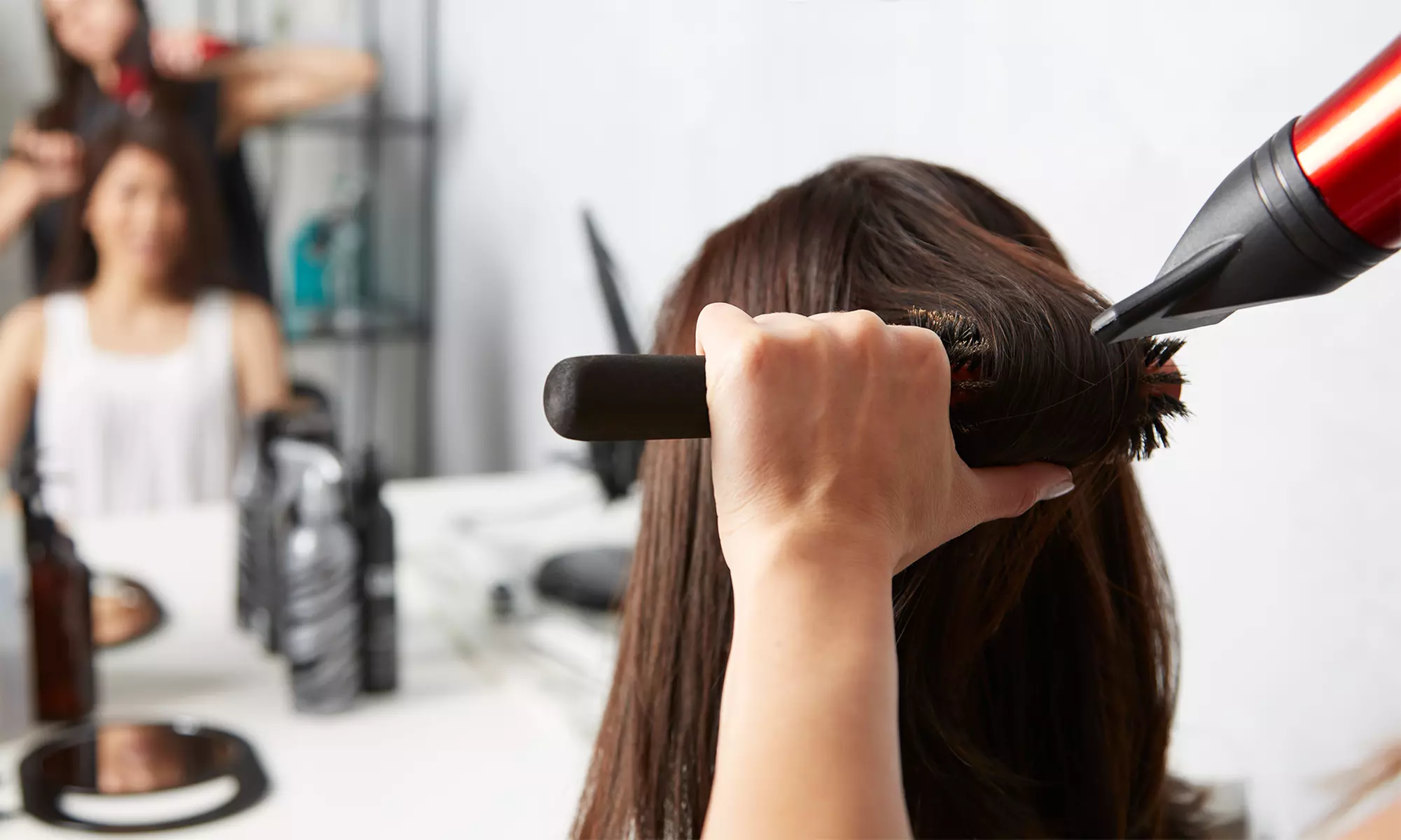 Brazilian Blowout and Take-Home Product with Optional Haircut at Designs by Danni (Up to 66% Off)
 - Primary Image