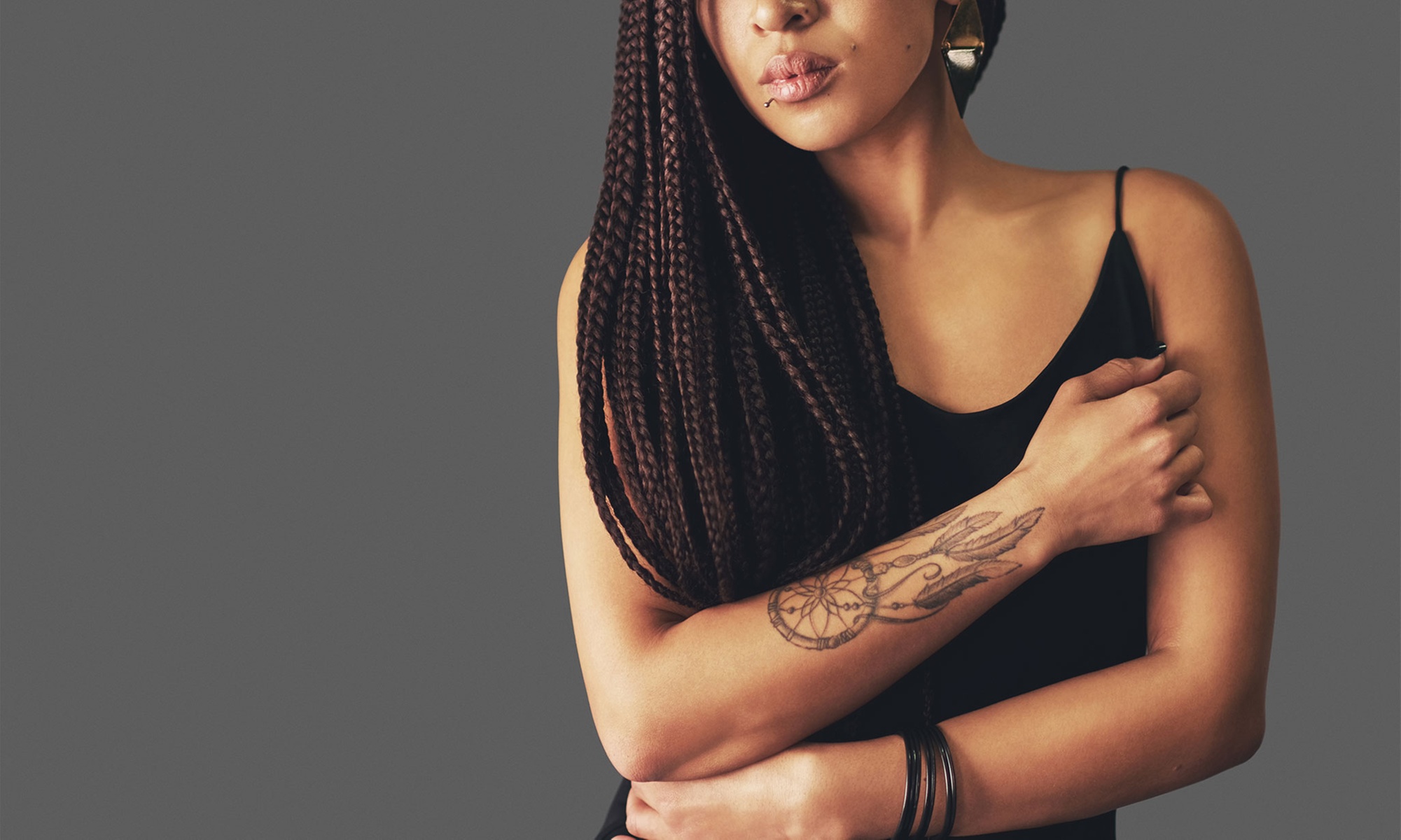 Small, Medium or Large Knotless Braids or Dreadloc Maintenance