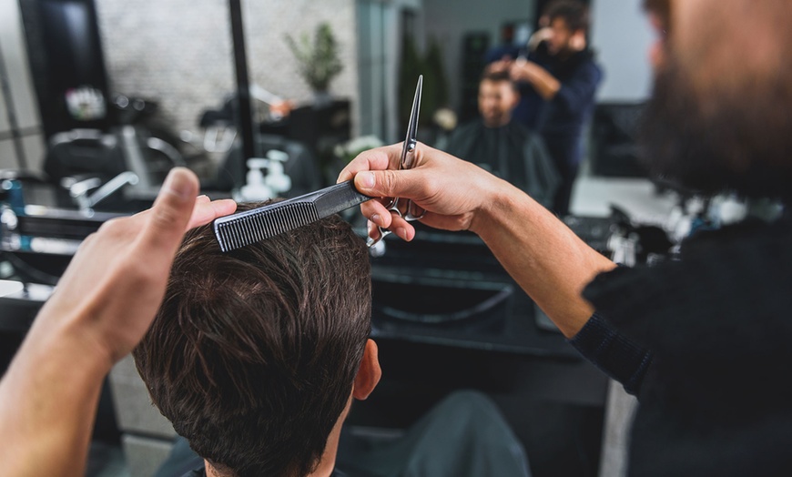 Image 1: Tailored Haircuts for the Modern Man at Eagle’s Nest Barber