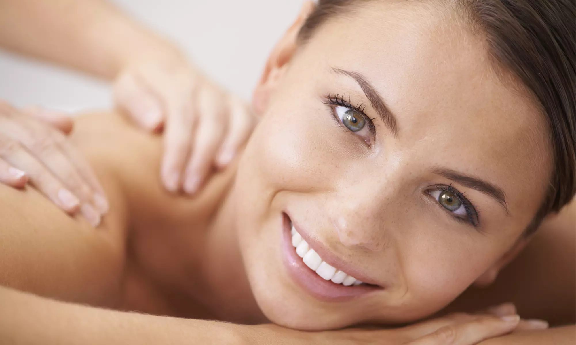One or Two 60-Minute Deep Tissue Massages and Redlight Therapy at L.A. Tan Spa (Up to 64% Off)   - Primary Image