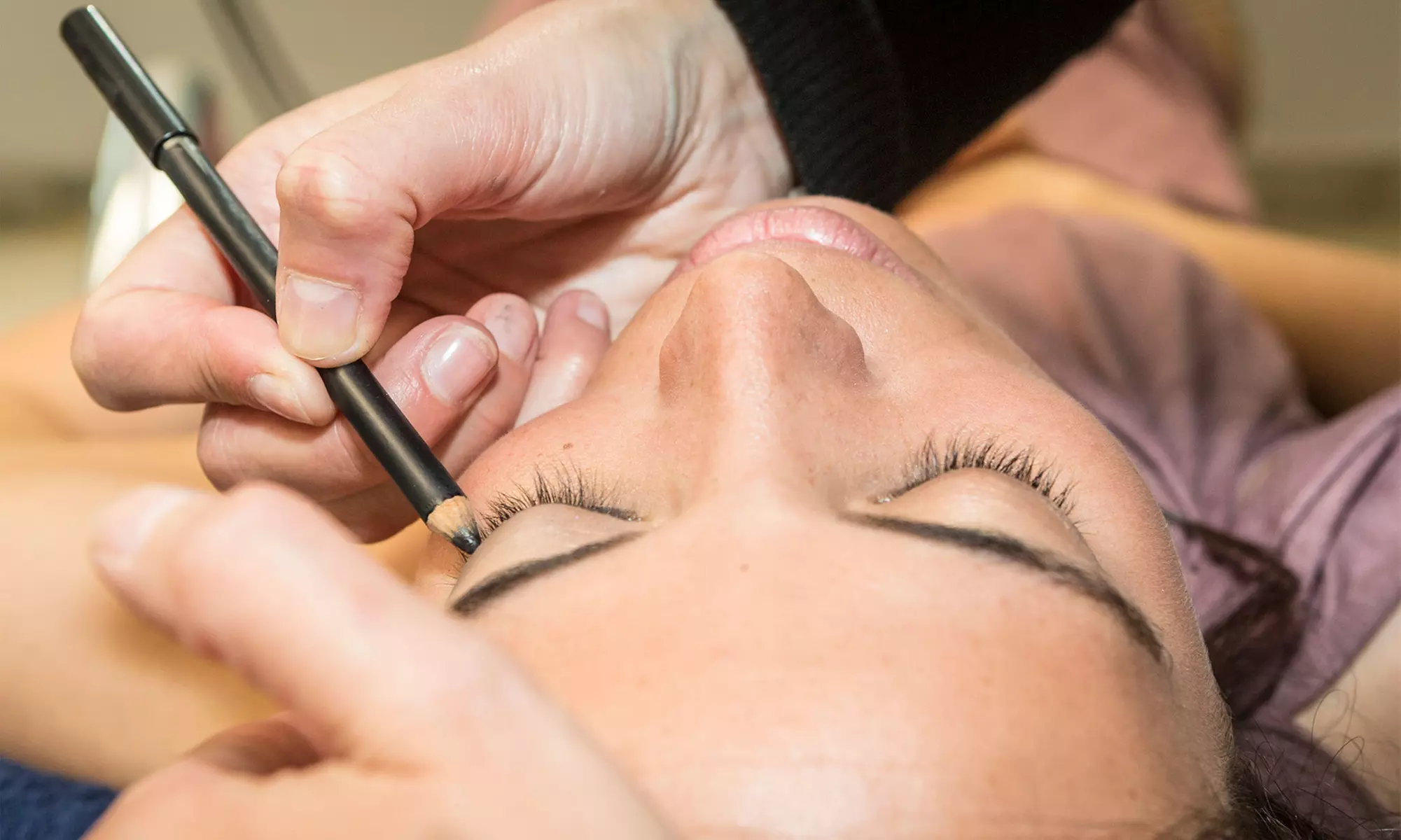 Experience Eye Lining Sessions at Red Scissor Hair Salon for Up to 33% Off - Primary Image