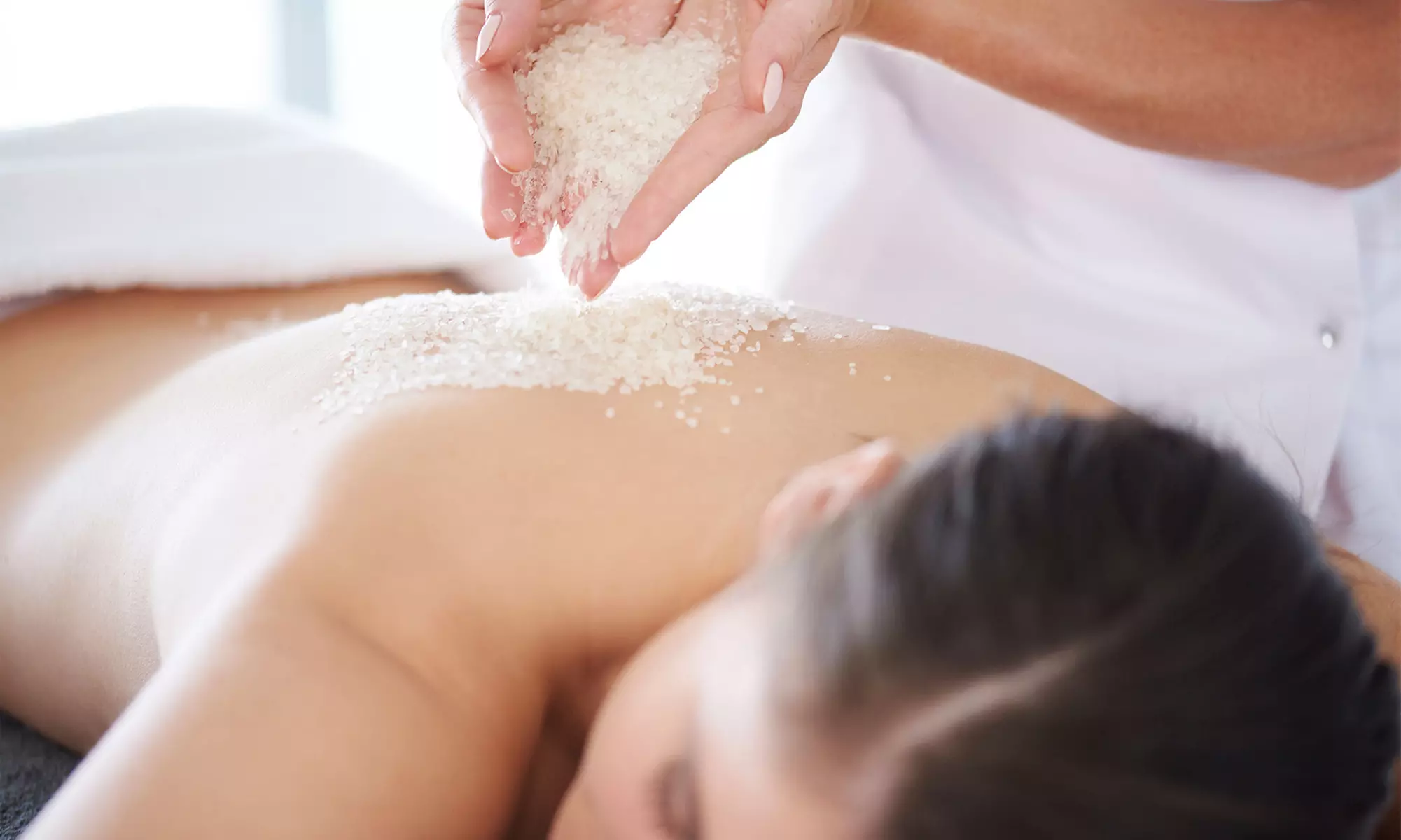 Skin Design offers back treatments or facials with extractions and masks up to 41% off, leaving skin smooth and glowing - Primary Image