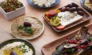 Kri Kri: Greek Dinner Banquet: 10 Meze and Glass of Wine for Two ($59) or Four People ($115) at Kri Kri (Up to $280 Value)