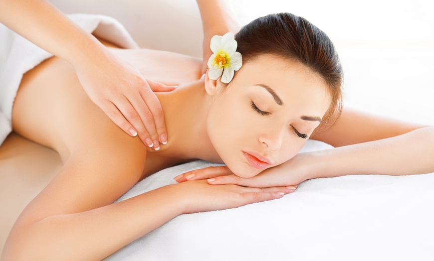 Image 1: 45-Min Head and Shoulder Massage, 60-Min Swedish or Women Womb Massage
