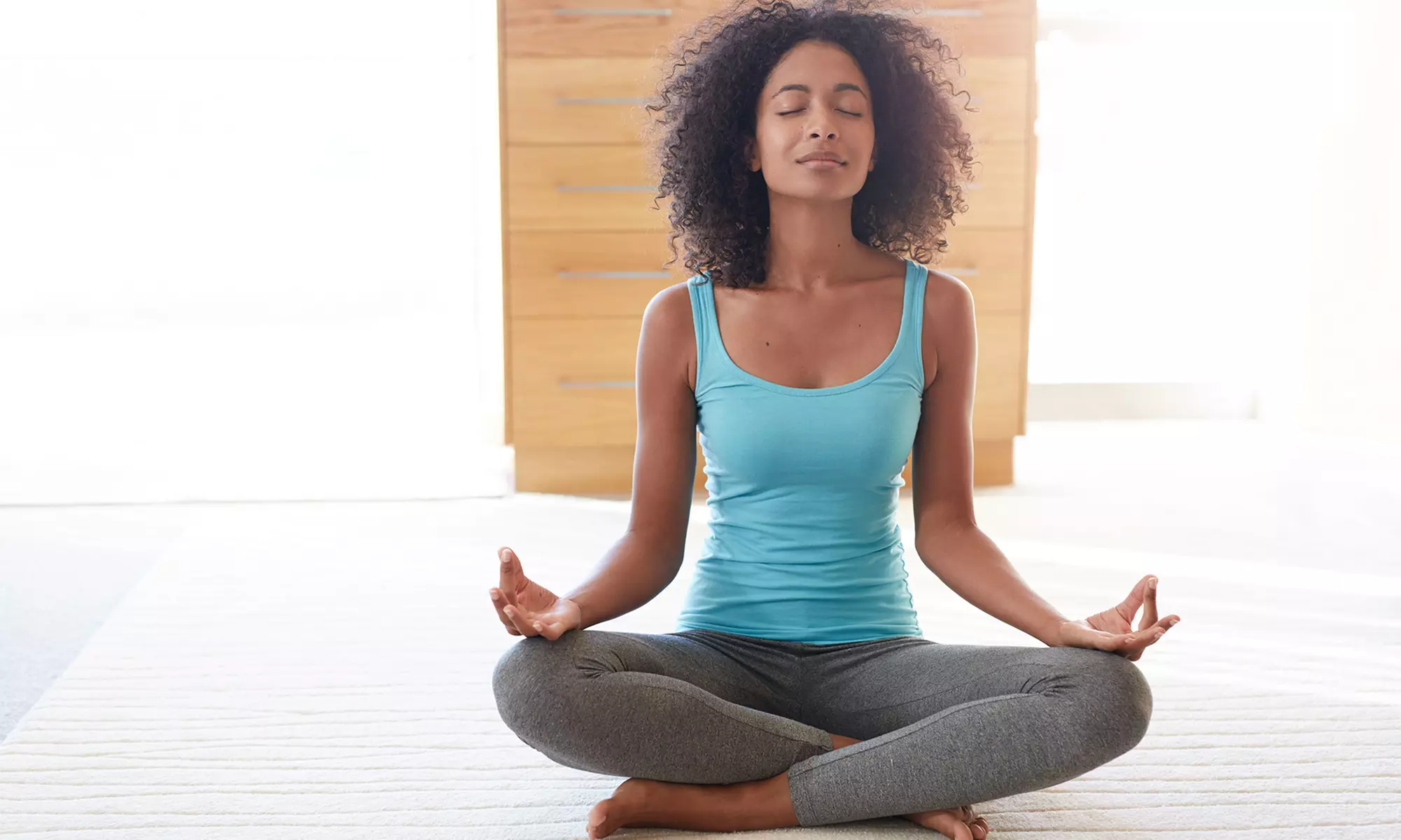 Yoga Sessions at Curly Q Yoga (Up to 80% Off). Three Options Available. - Primary Image