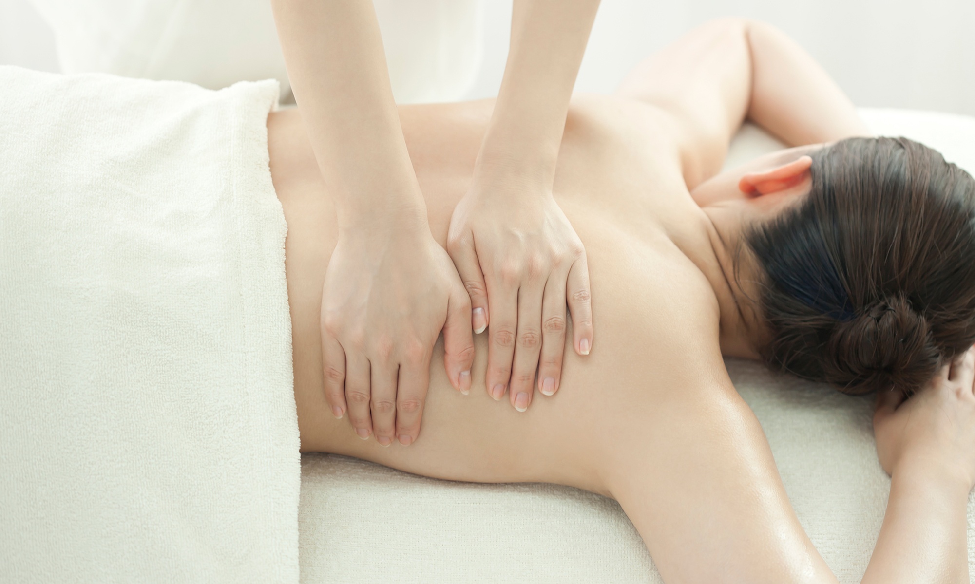 Deluxe Swedish or Signature Body Massage: Hot Stone and More