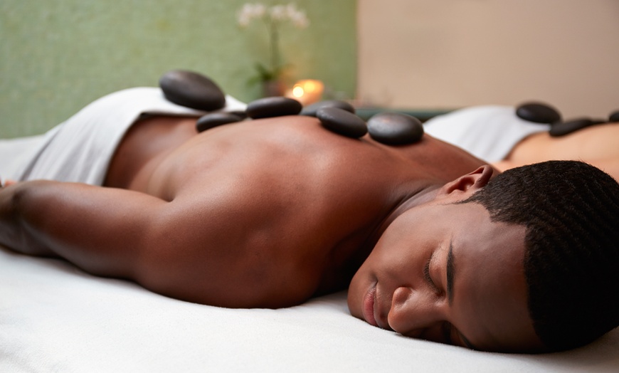 Image 1: Tranquil Escape Package: Full Body Massage + Hot Stones + Foot Therapy